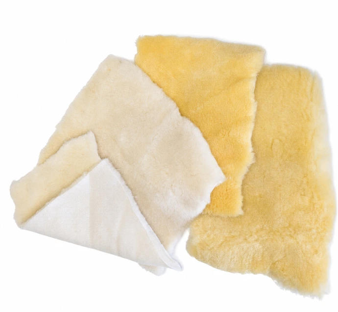 Slivernit wool lining material samples in natural, cream and yellow tones